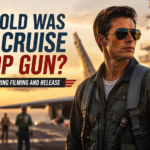 How old was Tom Cruise in Top Gun showing a young fighter pilot inspired by the 1986 naval aviation film era, representing Tom Cruise’s age of 23 during the movie’s release and 22 during filming.